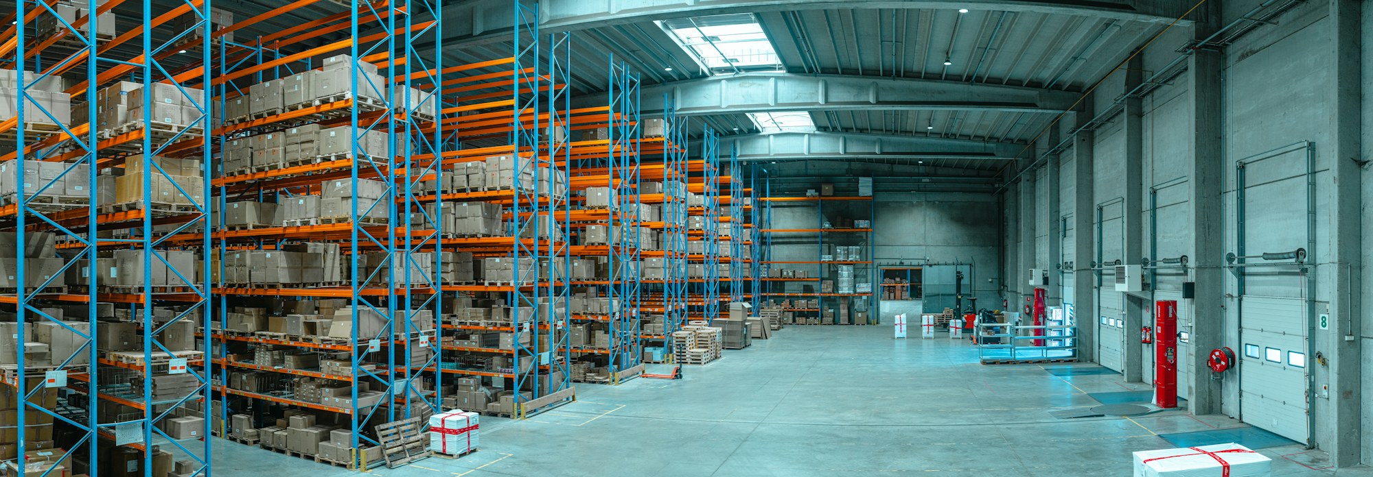 Long rows of warehouse racking stacked with cartons
